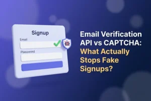 Signup form card with a green check mark beside the email field and a shield with a crossed-out robot, illustrating an email verification API versus CAPTCHA for stopping fake signups