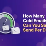 Speedometer with its needle in the green zone beside a stack of envelopes, illustrating how many cold emails you can safely send per day